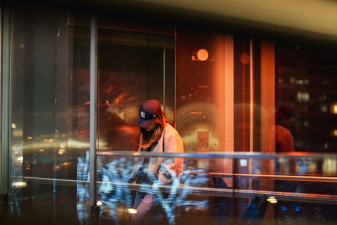 Person wearing virtual reality headset in modern setting